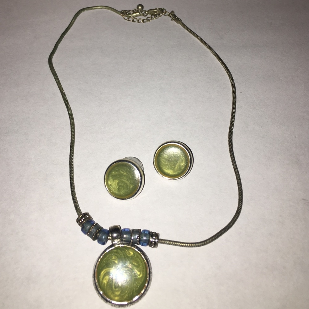 silver chain with beads and green stone
