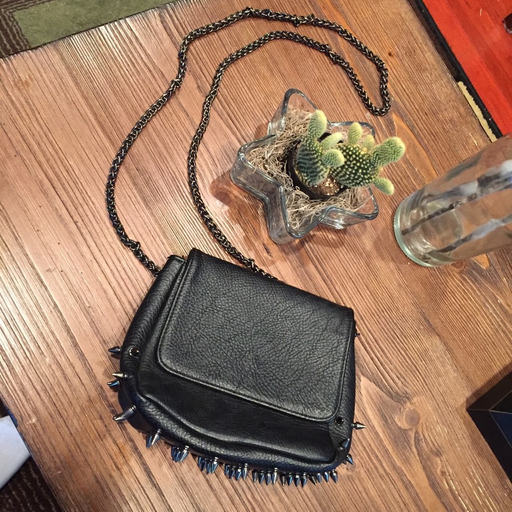 Spiked crossbody