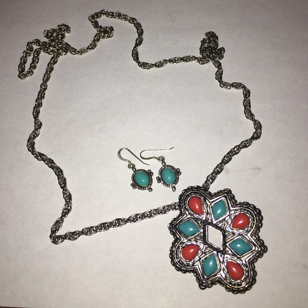 silver chain necklace with pendant and earrings