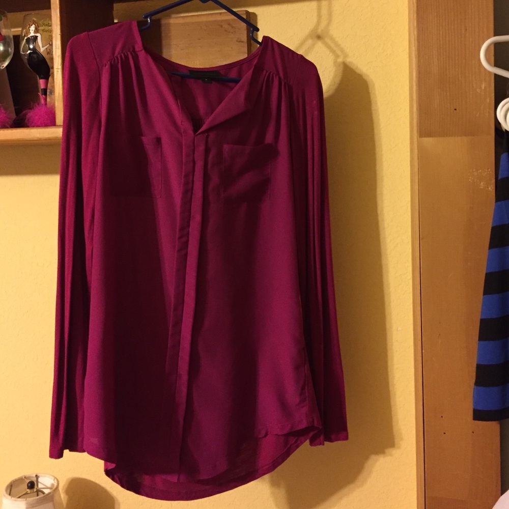 Long sleeve fuchsia colored blouse