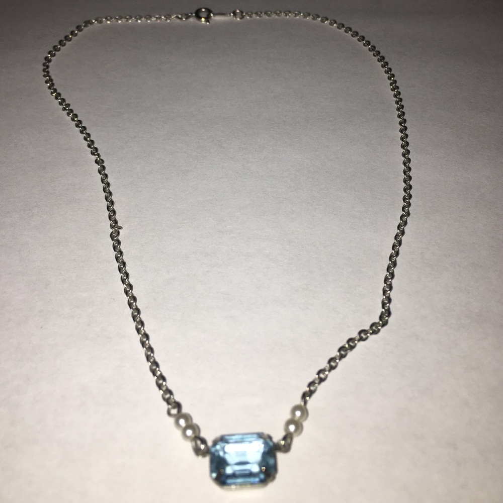 silver necklace with aquamarine stone