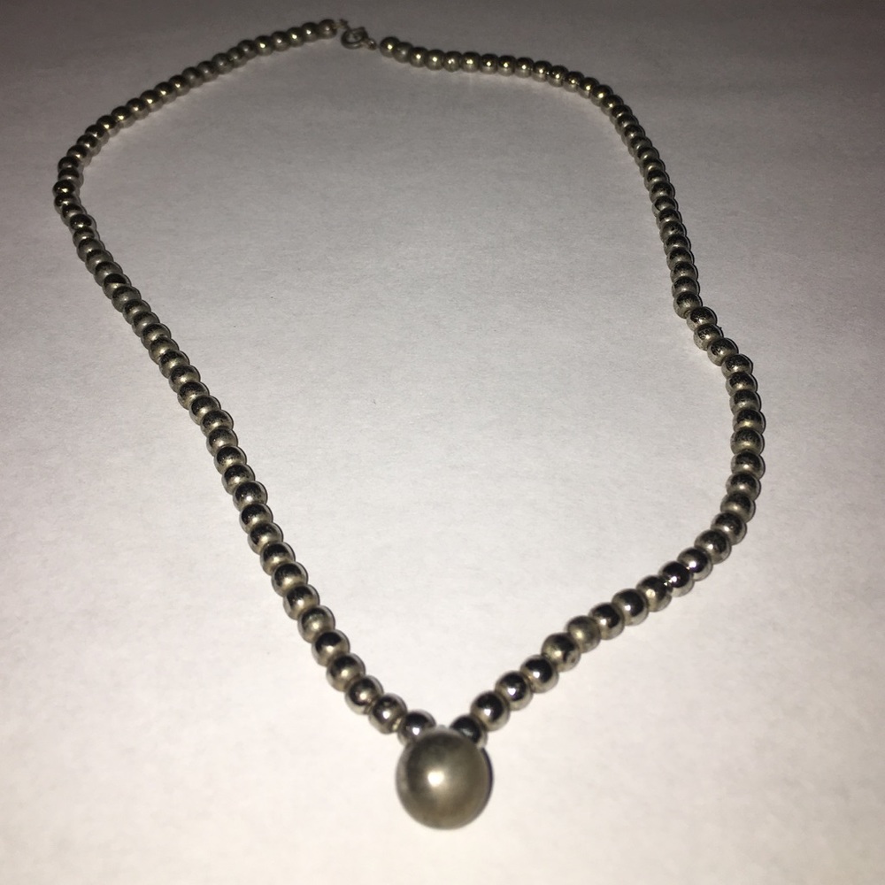 silver bead necklace with large silver bead