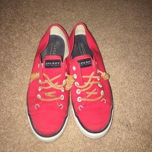 Red sneaker type Sperry Top Sider, worn twice.
