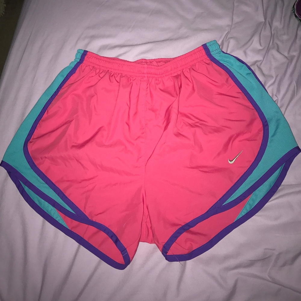 Dark pink Nike tempo shorts