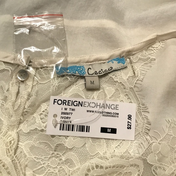 FOREIGN EXCHANGE IVORY TANK - Picture 3 of 4
