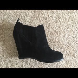 Black suede booties.