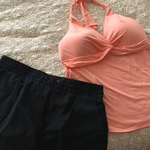 Swim suit size large. Never worn/with tags.