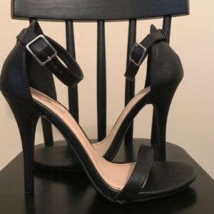 Strappy black heels