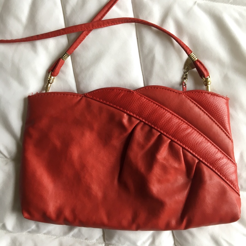 Red vintage purse with gold and scalloped accents