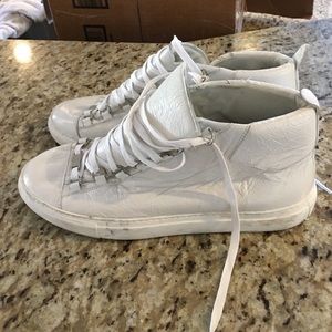 Balenciaga white leather high top sneakers.