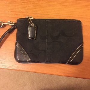Like new black Coach wristlet