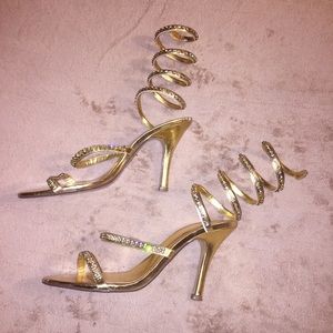 Gold and rhinestone heels