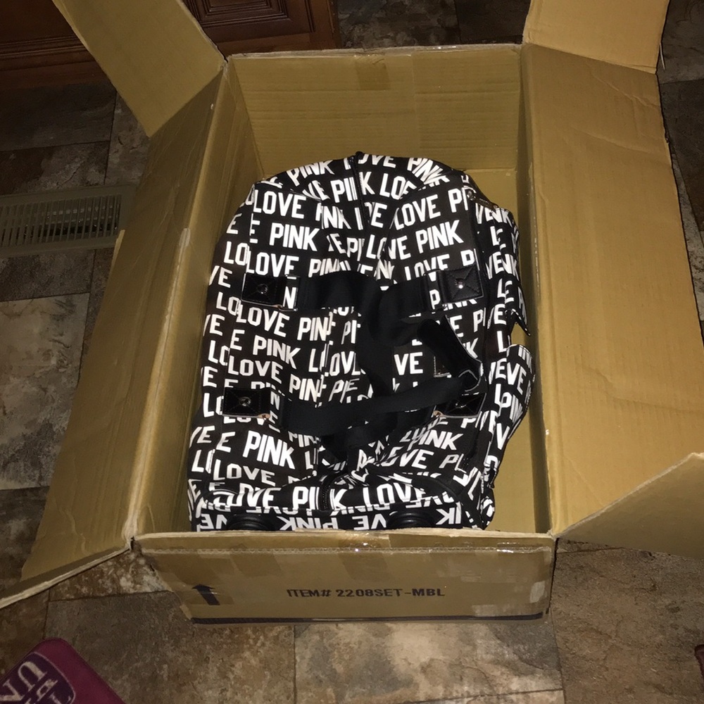 Vs pink suitcase UFT