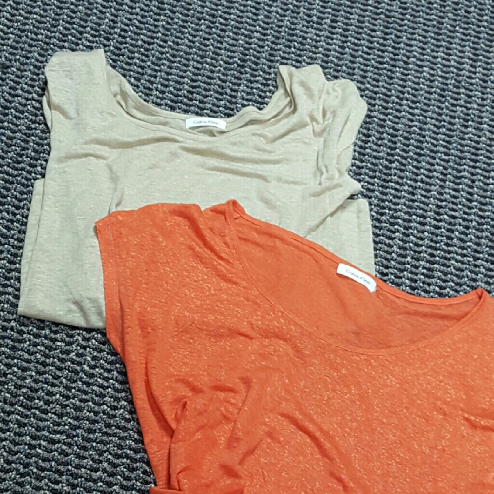 2 Calvin Klein sparkled shirts