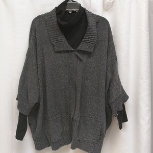 Kimono style zip front sweater.