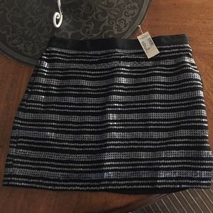 Black sequined mini skirt