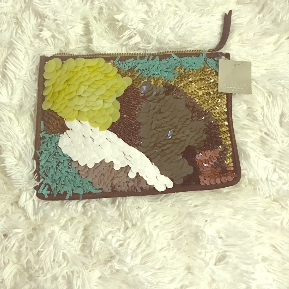 Sequined embellished clutch by Anthropologie