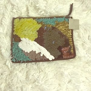Sequined embellished clutch by Anthropologie