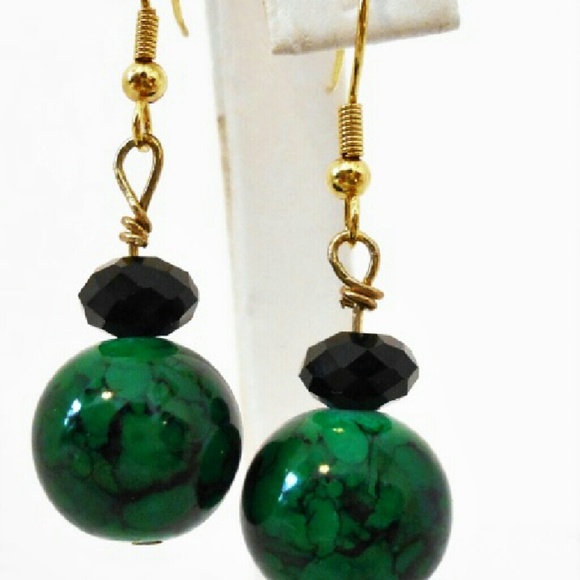 Green glass beads with black bicone crystals earri