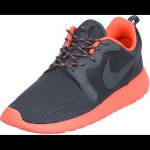 Nike black and orange roshes