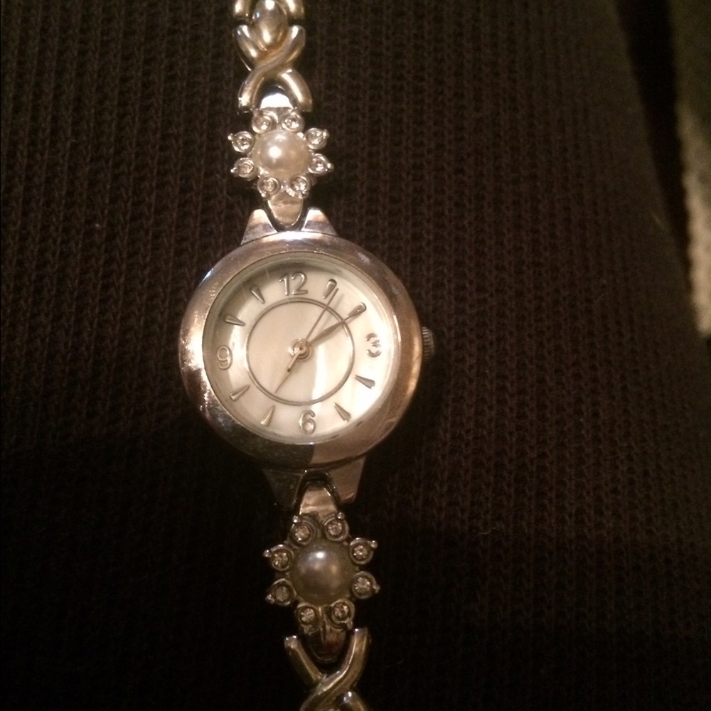 Silver linked watch