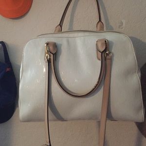 White Michael Kors bag.