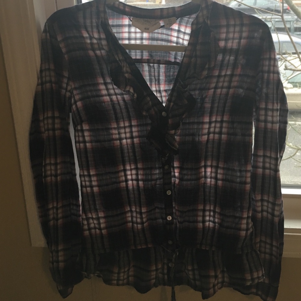 H&M flannel. Button up with some ruffles.