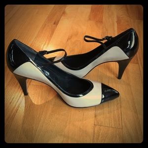 Tan and black patent leather Via Spiga heels.