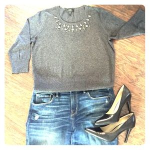 Rhinestone studded sweater.