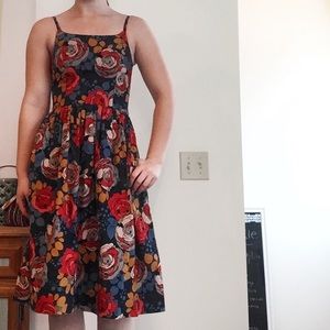 Red and blue floral print dress by Bee & Dot.