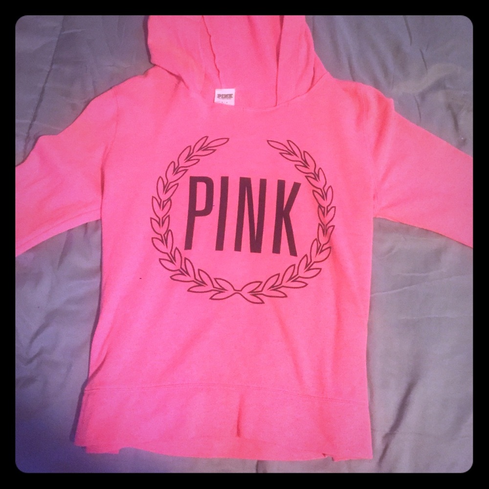 Bright pink colored (Pink) hoodie.
