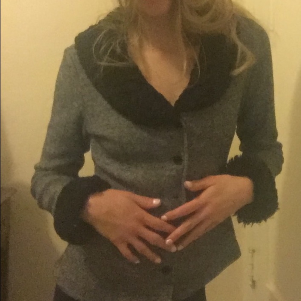 Fake fur trimmed sweater