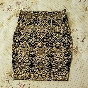 Tan and black torrid skirt