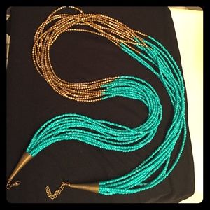 Turquoise and gold beaded necklace