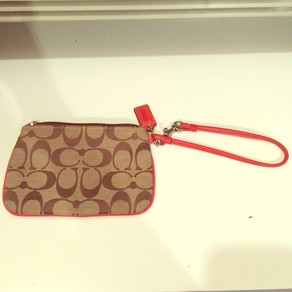 Chic orange coach wristlet