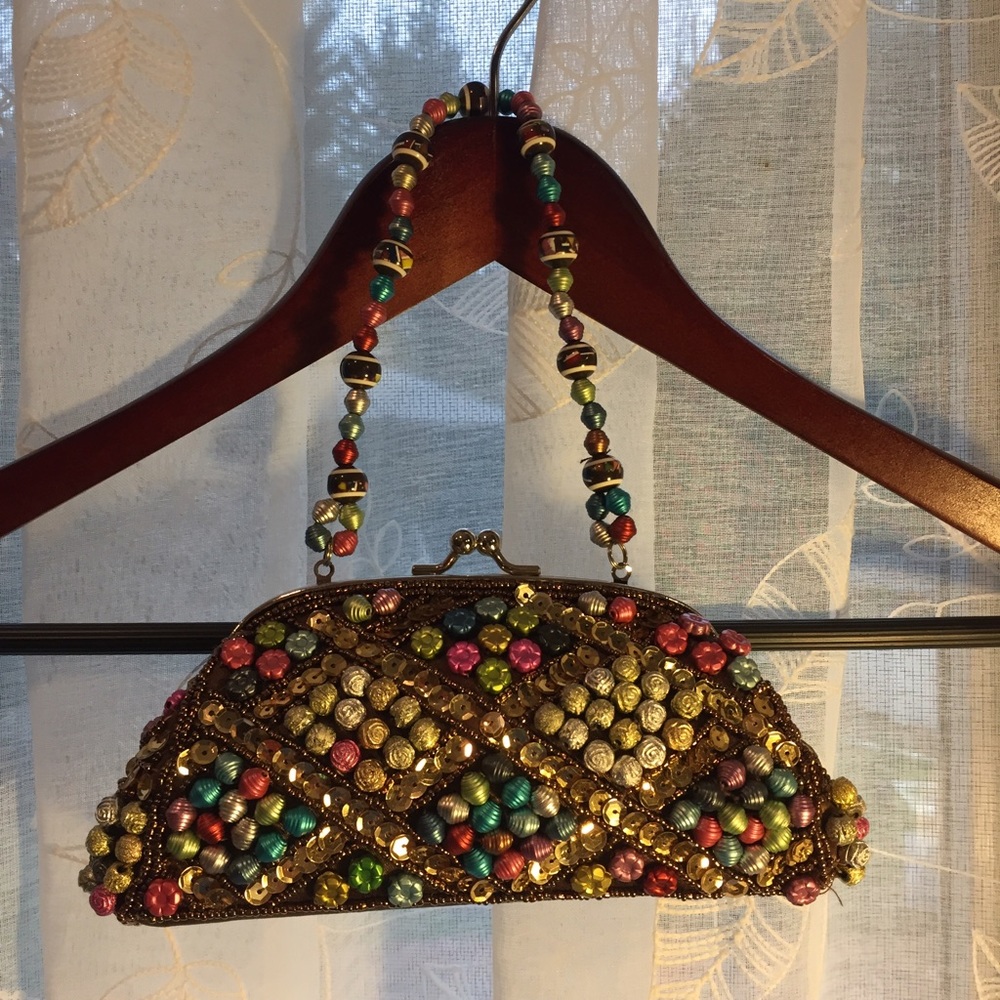 Pocketbook with beaded handle
