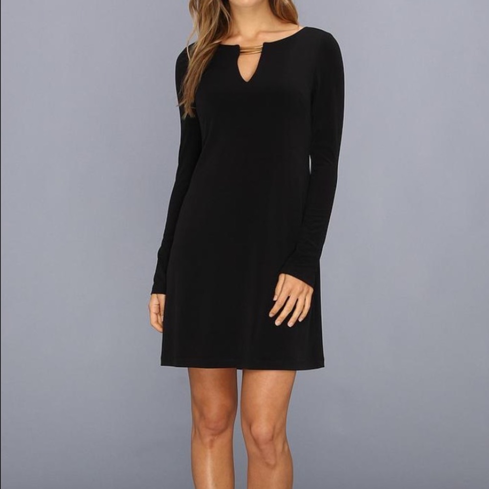 Black form fitting dress.
