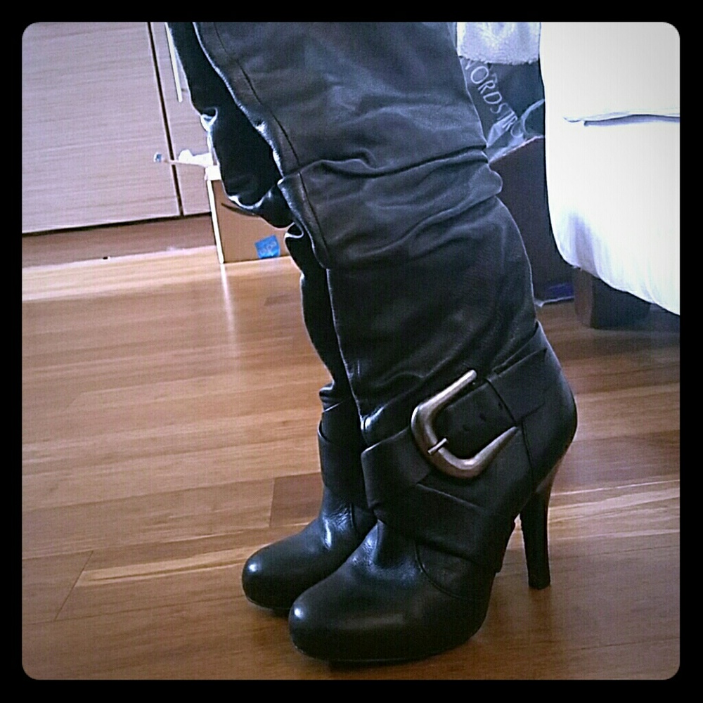 Black below the knee leather boots