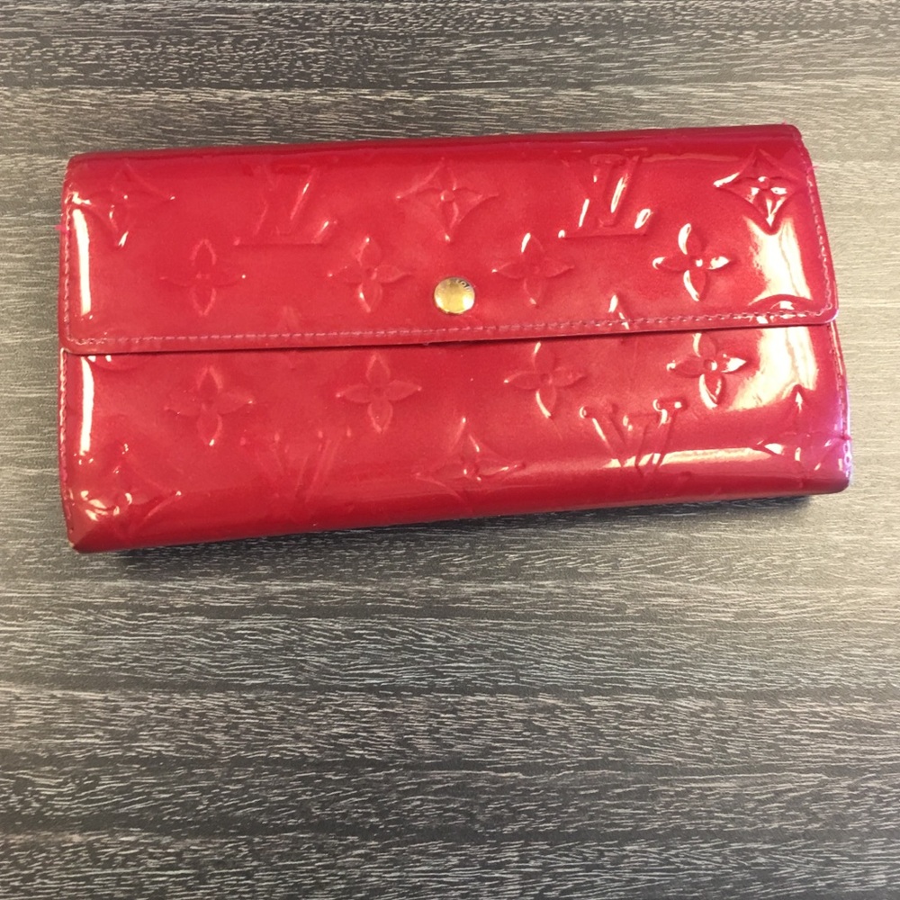Red patent leather Louis Vuitton wallet