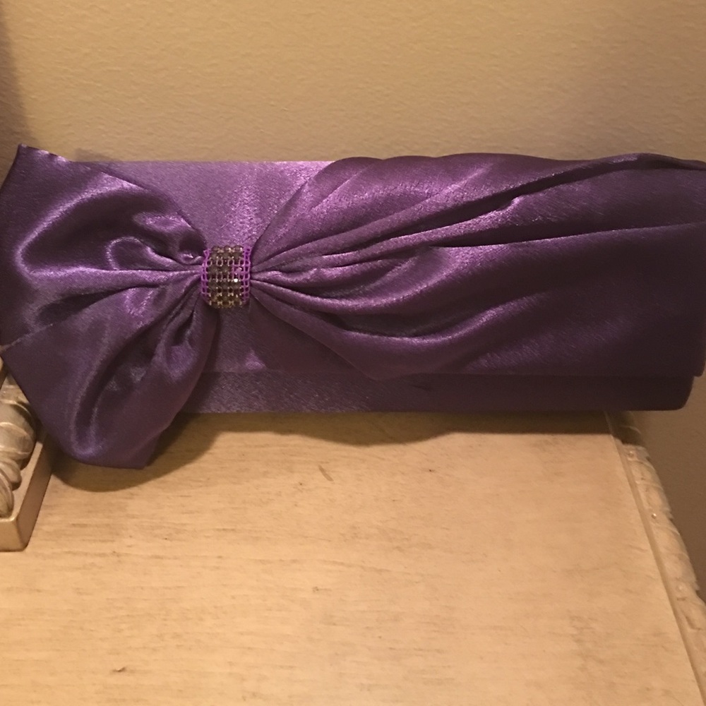 3/$29 Purple clutch