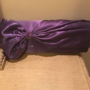 3/$29 Purple clutch