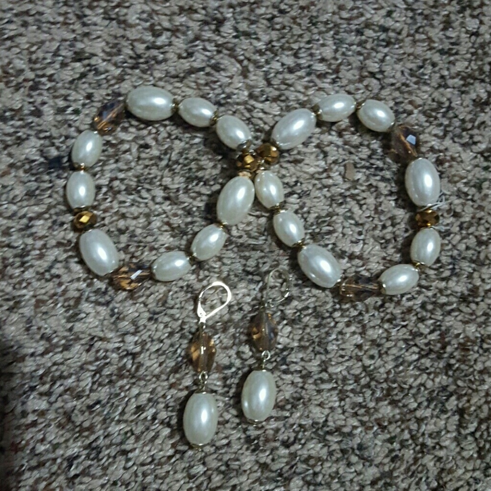 Bundle of bracelets with earnings
