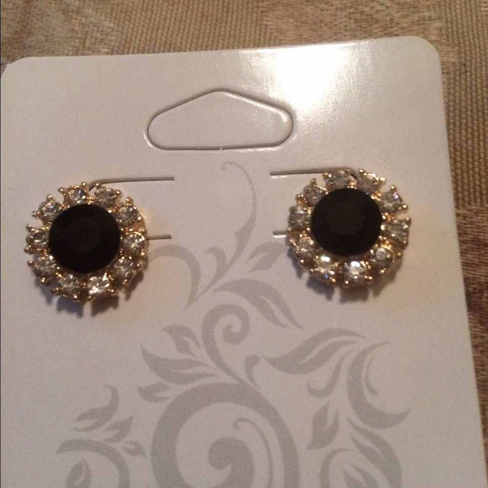 Black round earrings with diamond accent