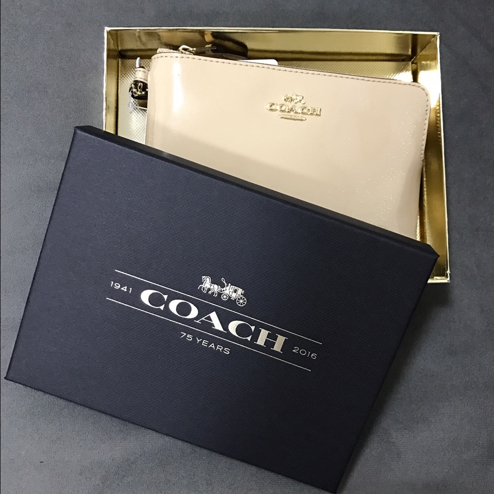 Brand new!! Coach wristlet