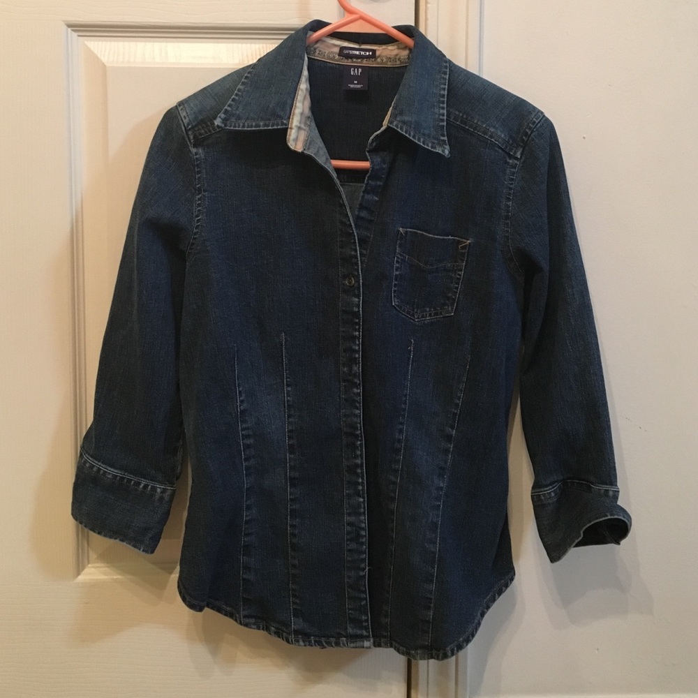Denim button up shirt.