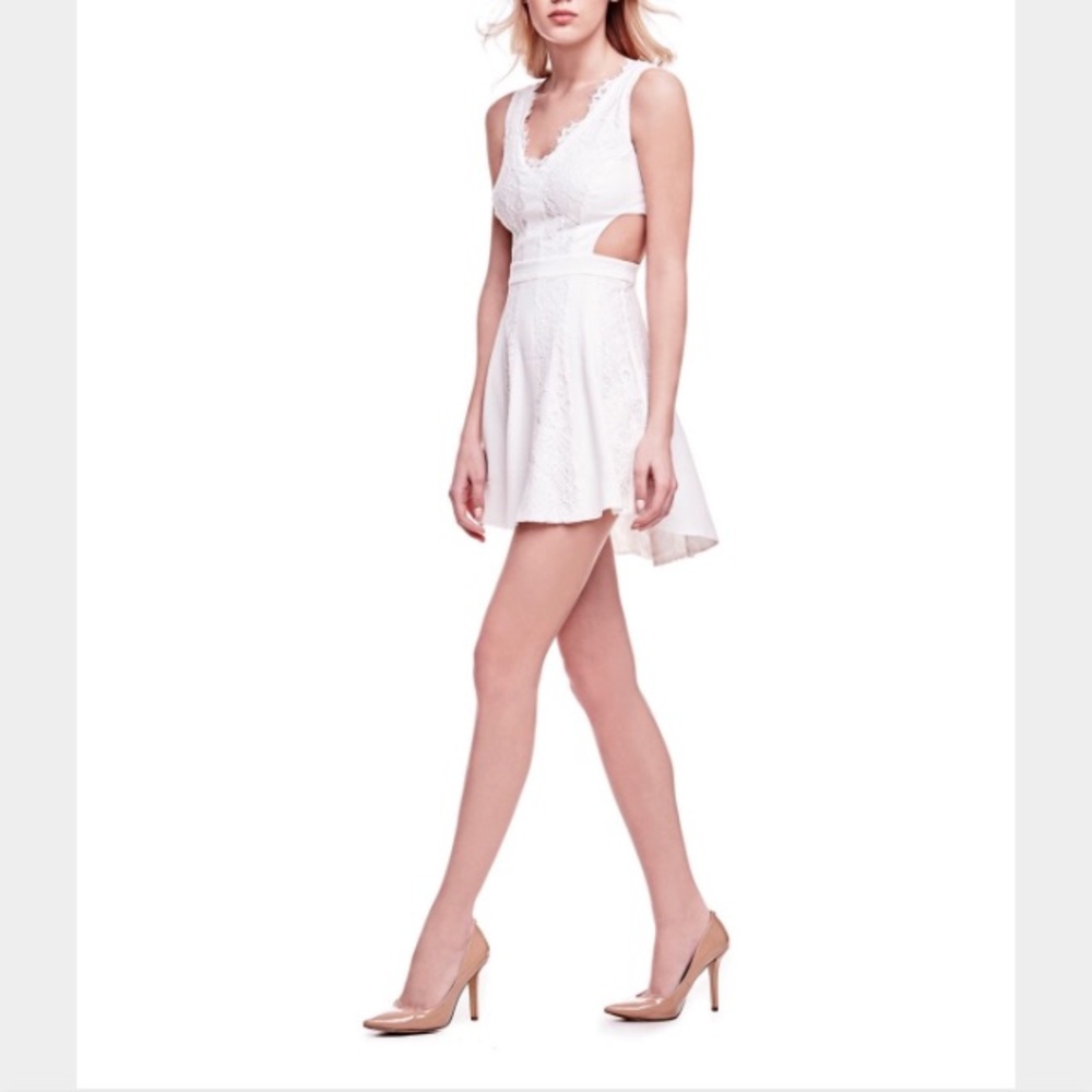 Lace Marciano cut out white dress. Size 8.
