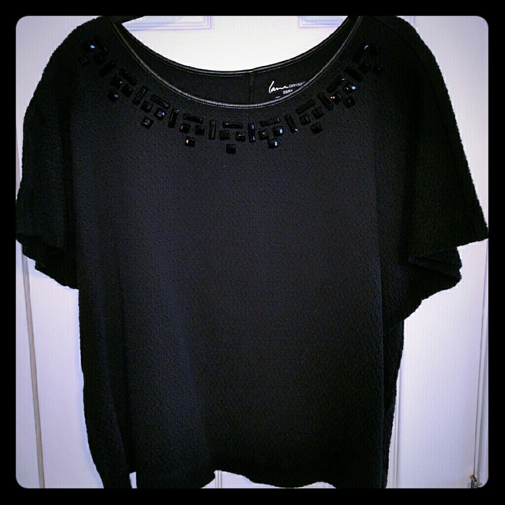 Black quilted top with jeweled neckline