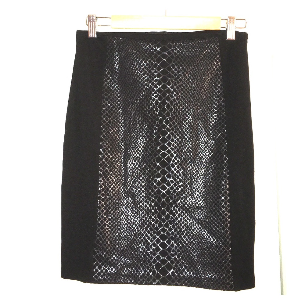 H&M black skirt with front lizard print. Size 10