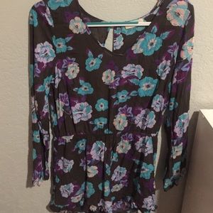 Long sleeved, open back floral romper