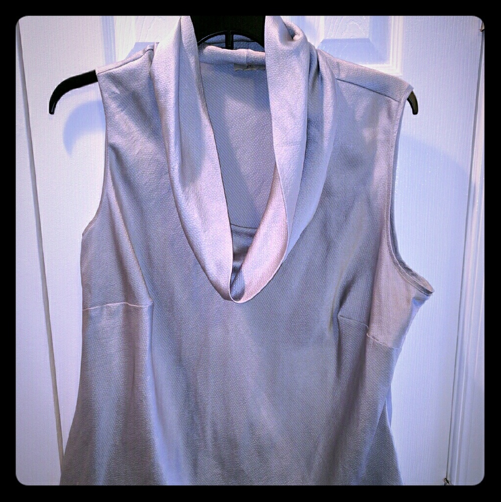 Sleeveless silver blouse